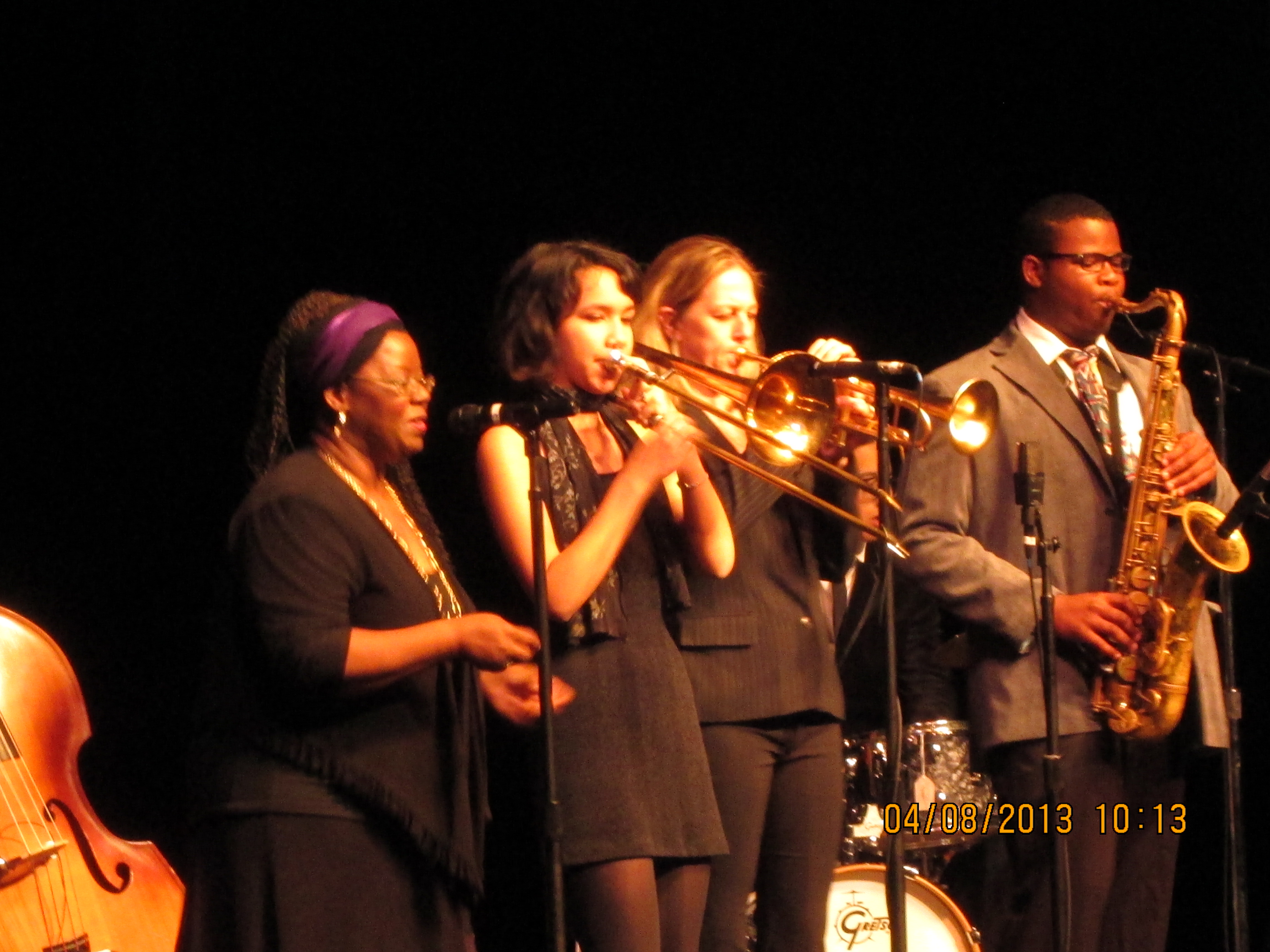 Photo: Blues Vocalist Lisa Henry, Jazz Trumpeter Ingrid Jensen, and students from the Los Angeles County High School for the Arts perform for Mississippi students.
